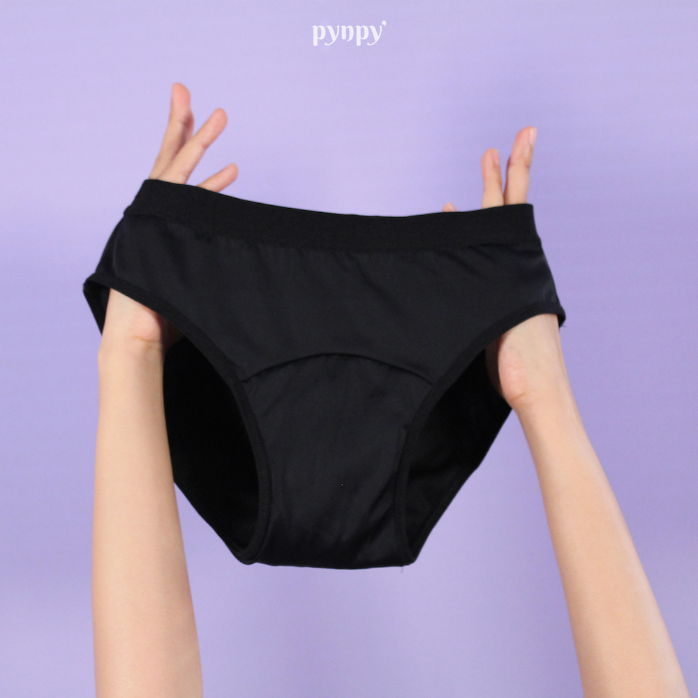hand holding pynpy' panties in the air