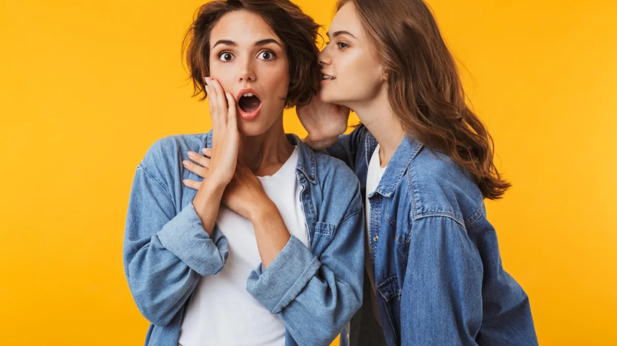 women telling a story to a friend