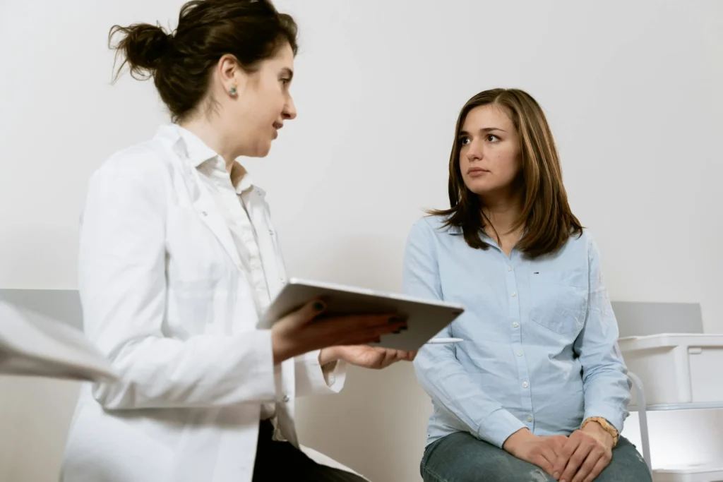pregnant woman with doctor