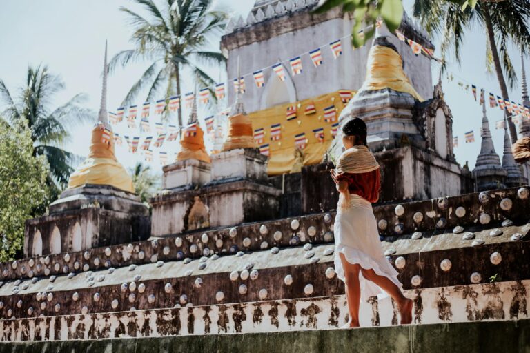 woman wearing white to temple