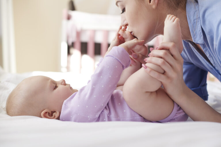 mother taking care of her baby