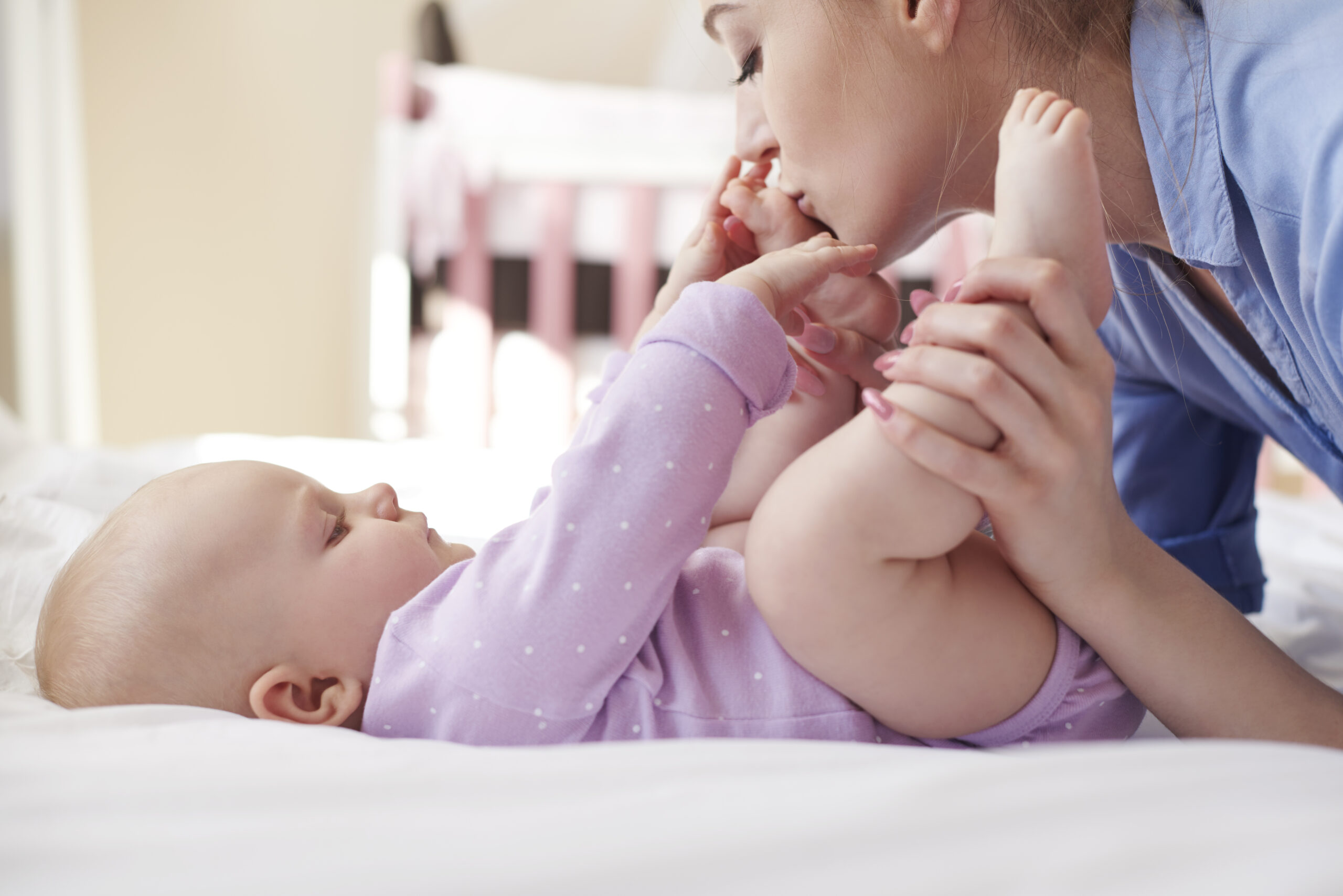 mother taking care of her baby